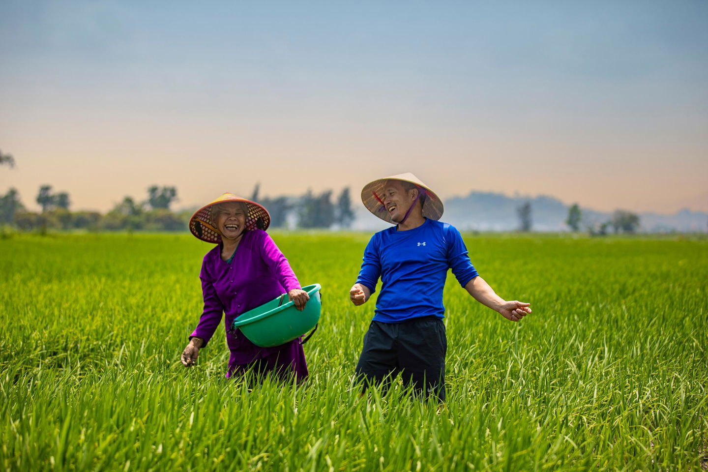 Vietnamese locals in Hue Rice paddies