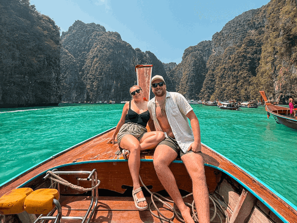 Group travellers on long boat in Thailand Koh Phi Phi